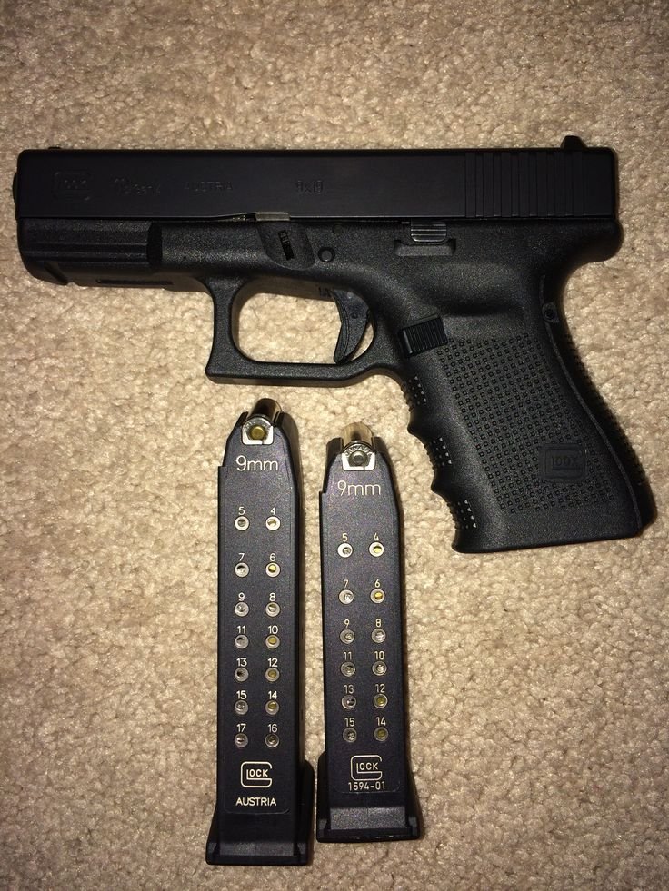 A sleek GLOCK 17 handgun displayed against a dark backdrop.